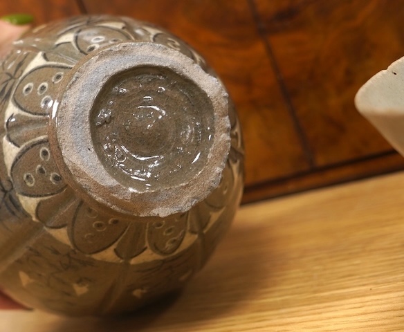 Five pieces of Chinese/Korean celadon comprising three bowls and two vases, 31cm high. Condition - some breaks